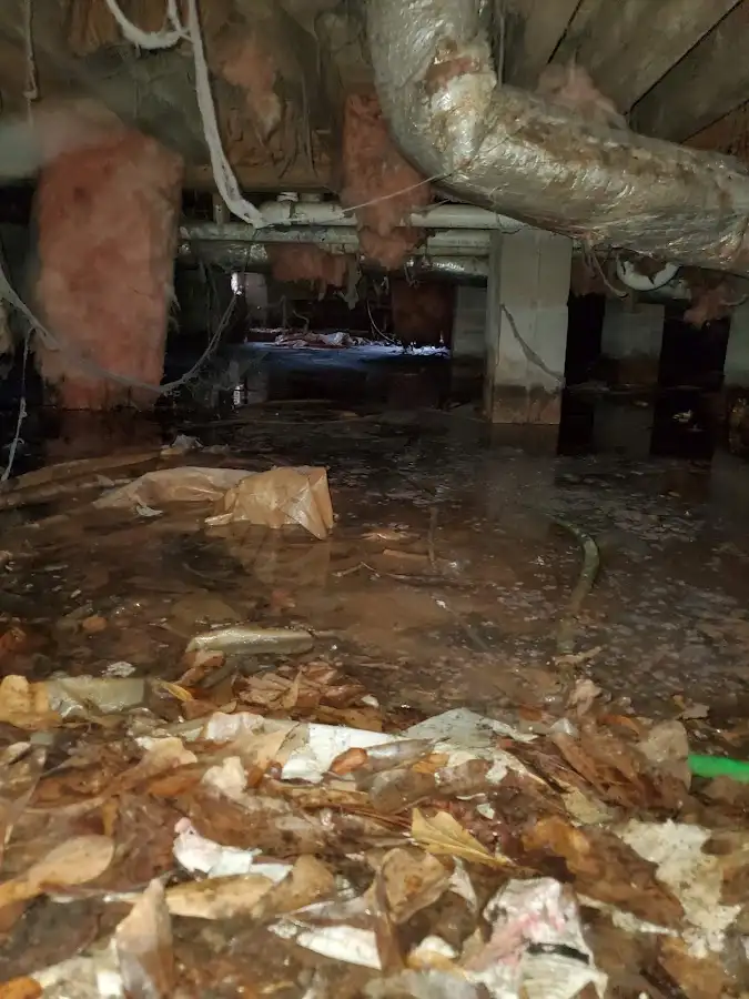 Crawl space flood assessment for Commercial Water Damage Restoration in Orangetown