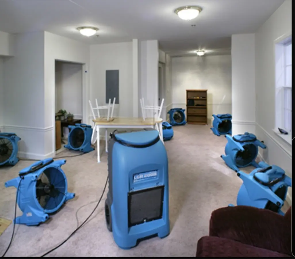 Air movers and dehumidifier setup for Water Damage Restoration in Orangetown